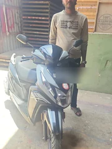 Zoop customer with their two-wheeler